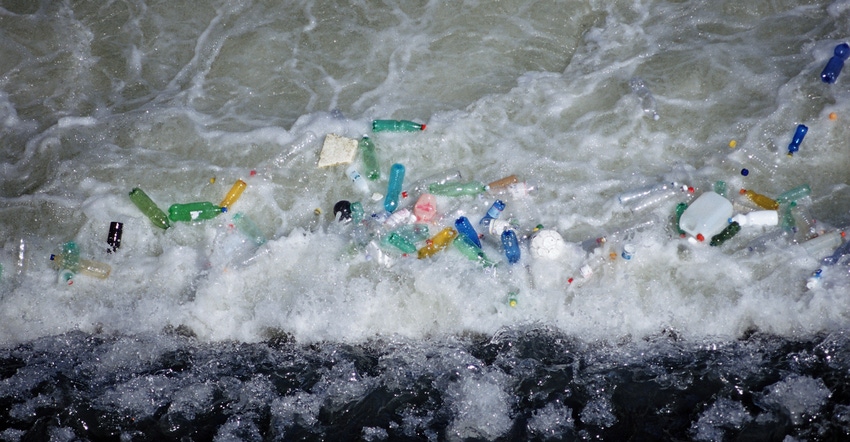 ocean plastic washing up on shore