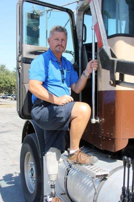 Rick Ottinger sanitation collection worker accident victim prosthetic
