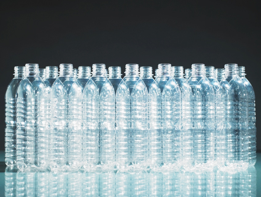 plastic-bottles-all-same-empty-blk-bkgd-TS_0.jpg