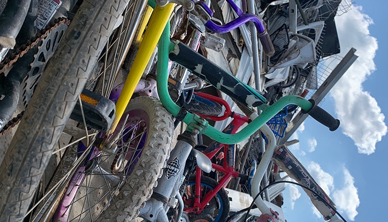 Redrock Environmental Rescues, Refurbishes Bikes from Landfill