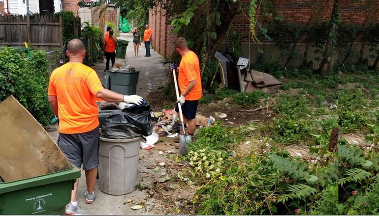 Traveling Trash Men Take on Cleanup Effort in Baltimore