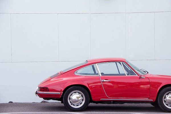 Raisin UK-red vintage car side profile