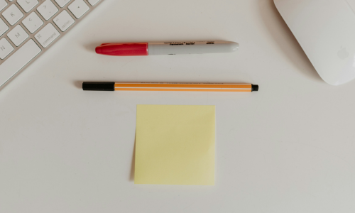 Raisin UK-calculator and pen on financial sheet