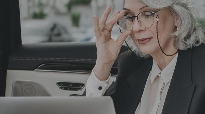 Raisin UK-Woman working in car