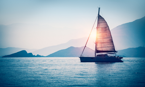 Raisin UK-sailing boat at sunset
