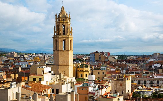View of Priory Church of Saint Peter's bell tower, in Reus, a city in Catalonia, Spain. 