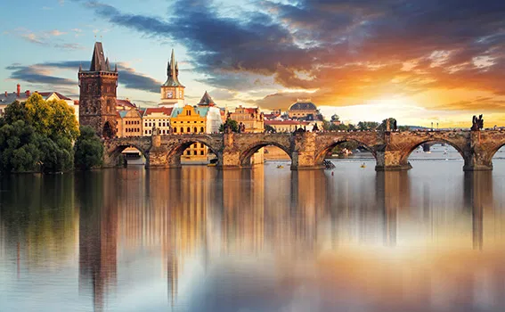 The Charles Bridge in Prague, Czech Republic during sunset.