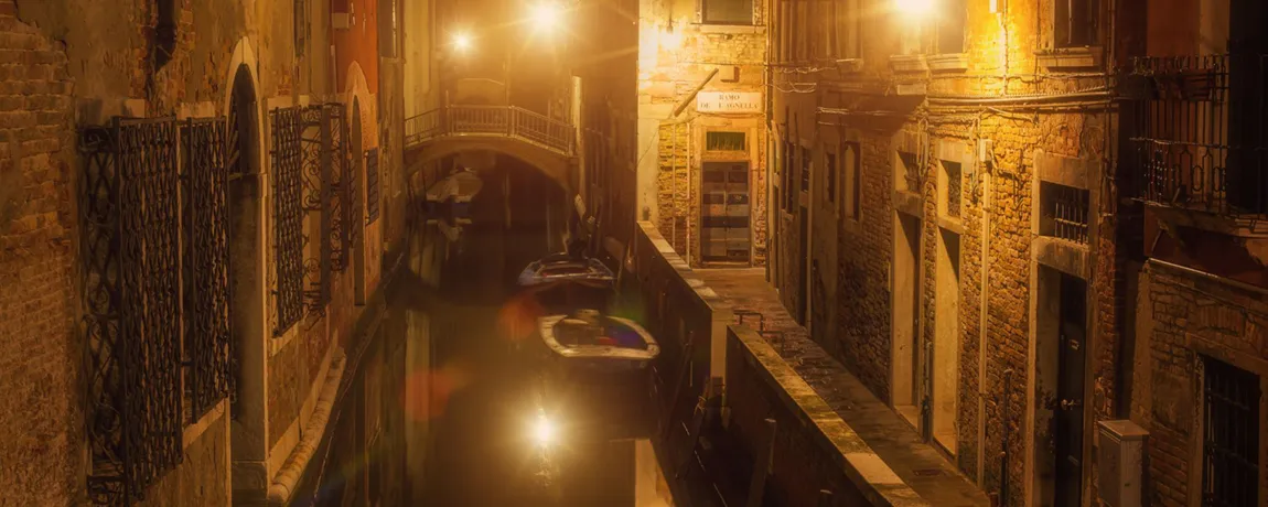 narrow canal Venice Italy.webp