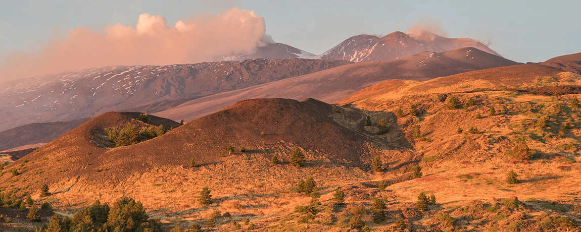 Autumnal forests and lava flows on the Etna Volcano, Catania, Italy