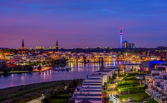 Phoenix Lake and city skyline during sunset in Dortmund, Germany