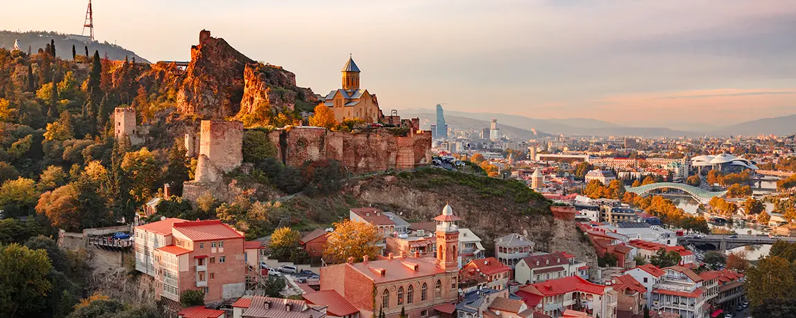 sunset-view-of-old-Tbilisi-Georgia-from-a-hill.webp