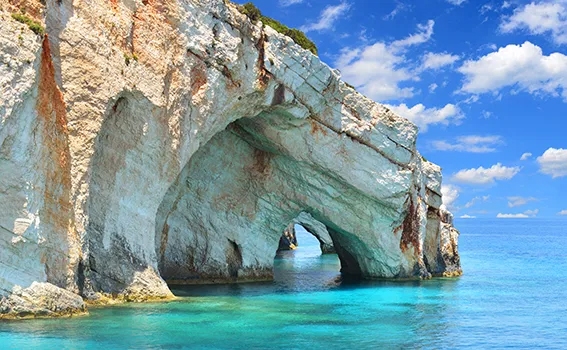 Caves in blue water on a beach in Zante.
