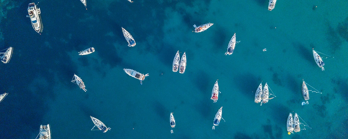 A collection of boats on the water in Europe