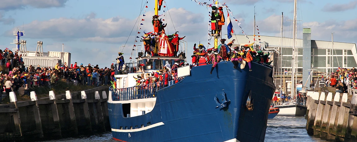 Santa Claus arriving in Holland on a boat
