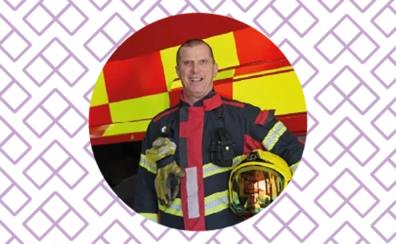 David Hughes, Airport Firefighter, smiling for a picture