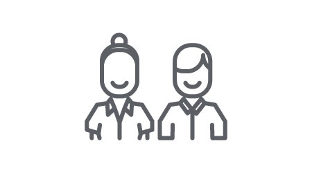 Male and female workers in uniform icon, demonstrating guest experience.