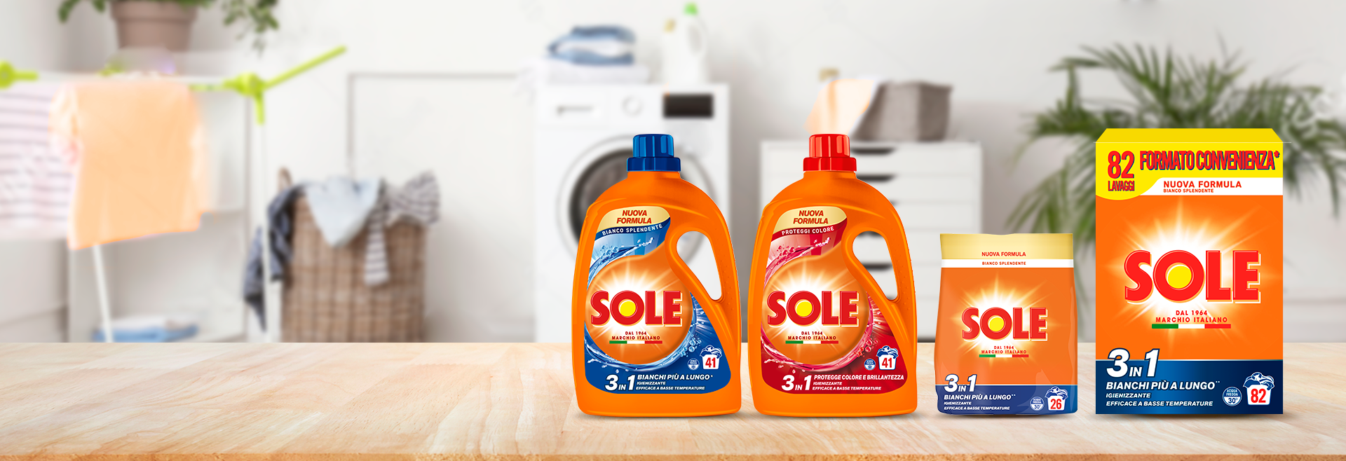 Gamma Sole detersivo su piano di legno con lavanderia sullo sfondo