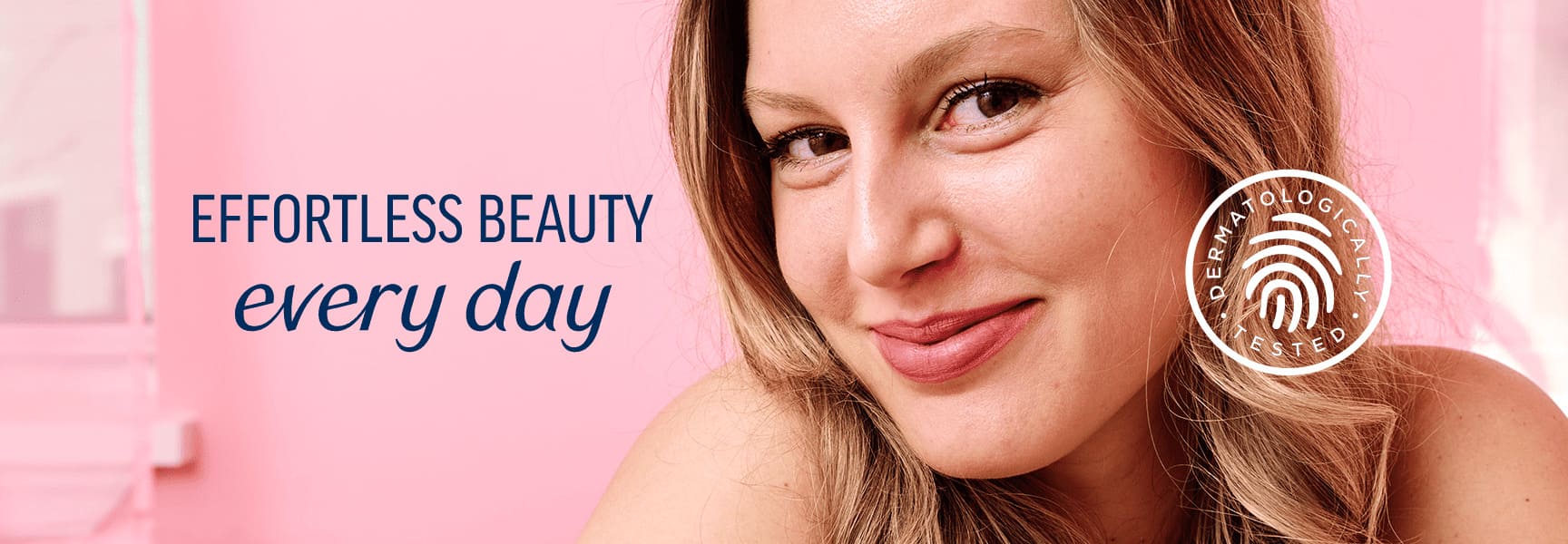 Close-up of a smiling woman with text "Effortless beauty every day."