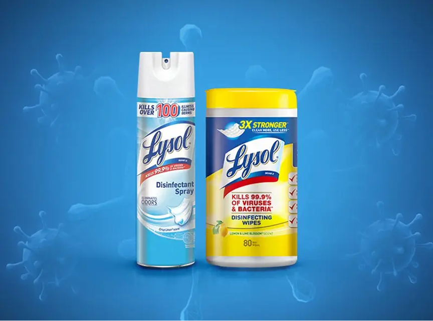 A Lysol disinfectant spray and wipes against a blue background with germ-like graphics.