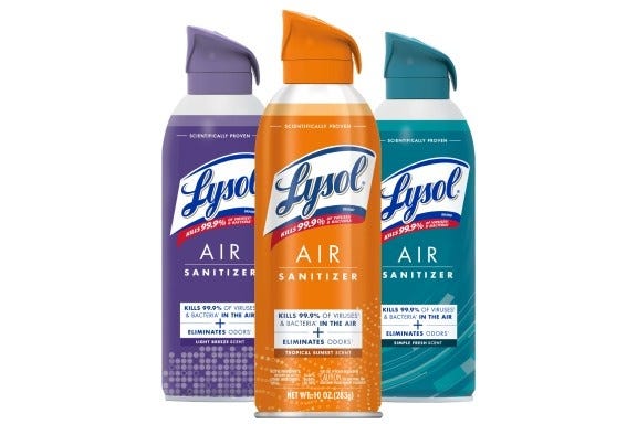 Three cans of Lysol air sanitizer in various scents displayed in a row.