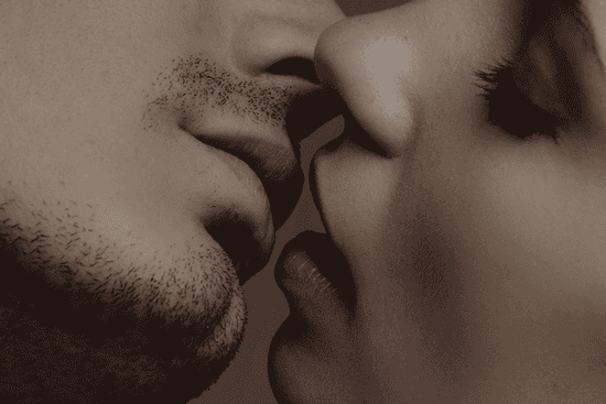 Two people about to kiss