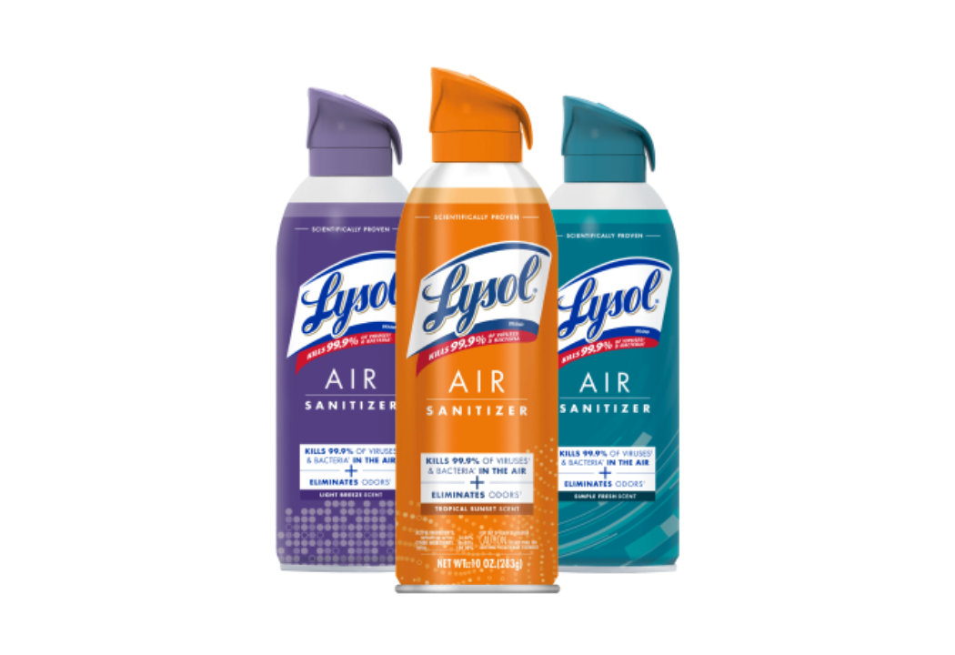Three cans of Lysol air sanitizer in various scents displayed in a row.