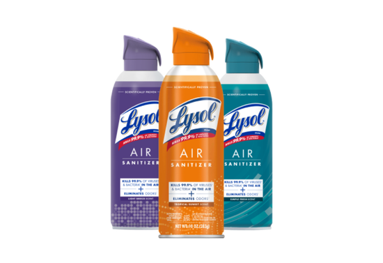 Three cans of Lysol air sanitizer in various scents displayed in a row.