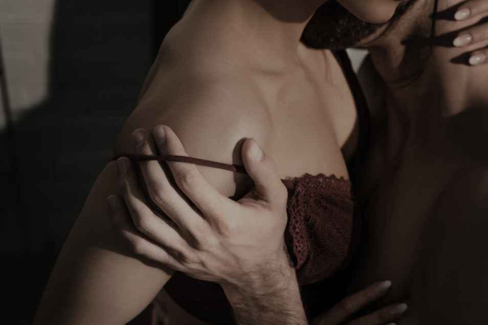Couple undressing to spice up their sex life