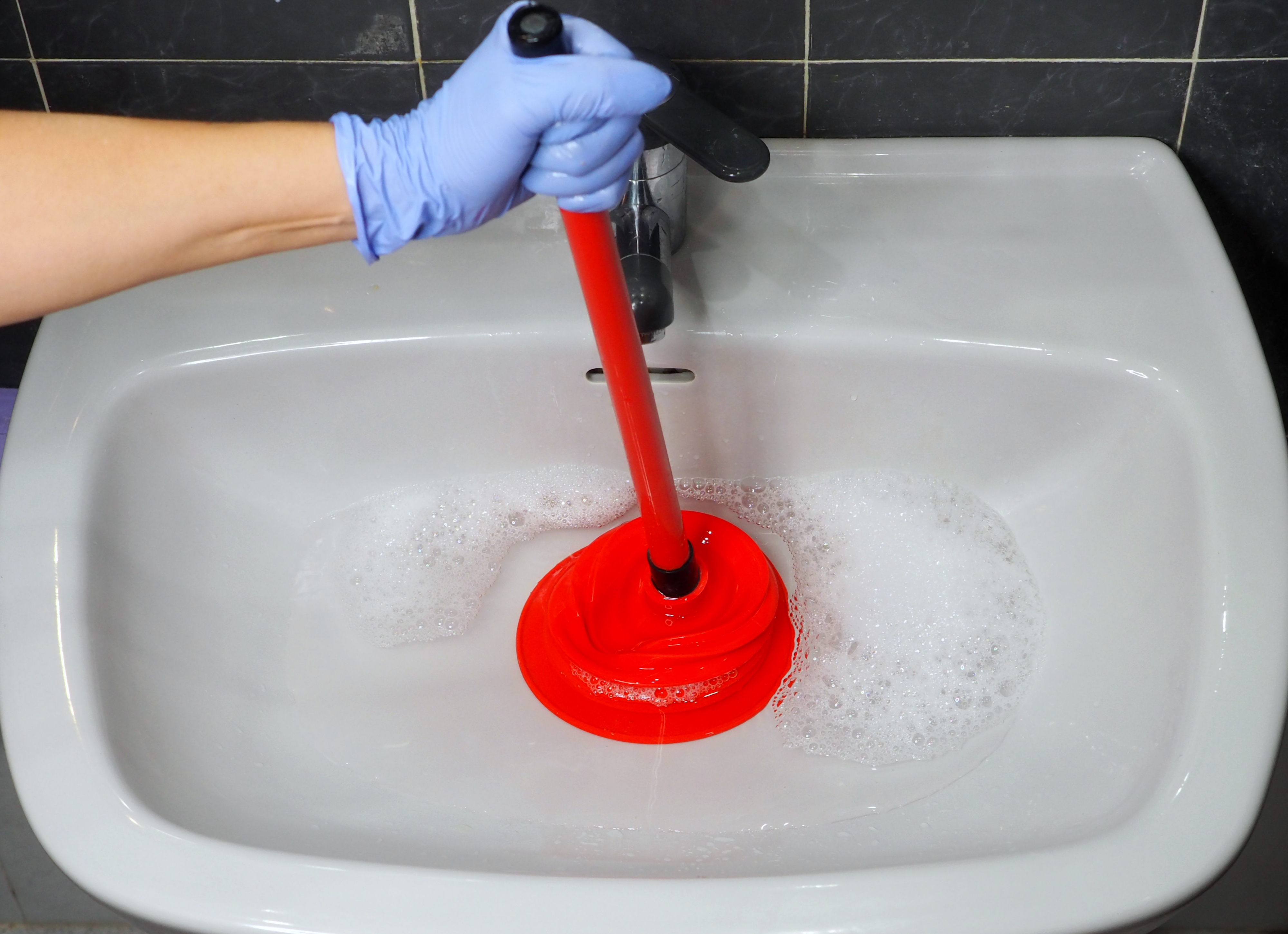 Using a clogged pipes clean a drain
