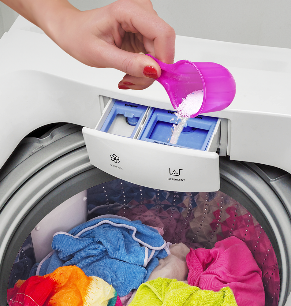 1 LAVADORA oxi action rosa en polvo