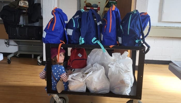Backpack Distribution Common Ground Farm's BackPack Program goes the extra mile