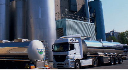 Trucks in front of a dairy company