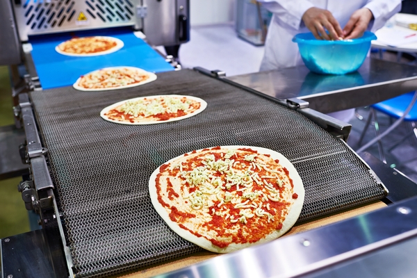 Pizza on Conveyor Belt
