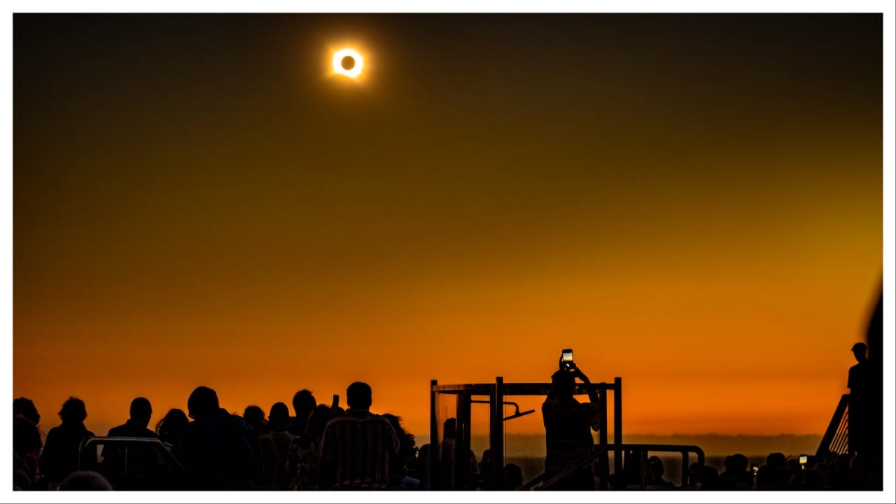 Guests onboard cruise ship Queen Anne watch solar eclipse