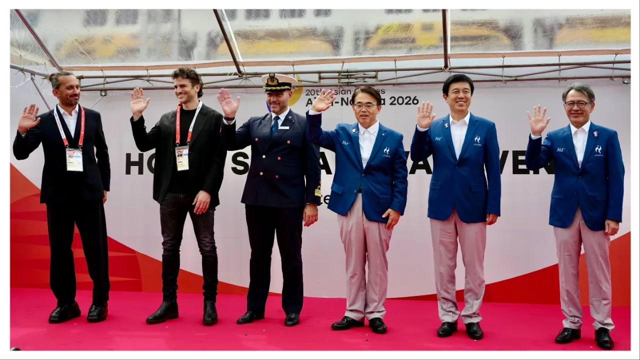 members of the 2026 Asian Games Organizing Committee and master of Costa Sernea wavinf on ship's arrival to Port of Nagoya