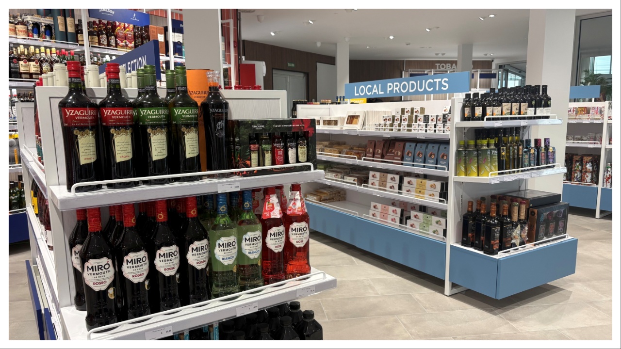 Drinks and local products displayed in duty free retail shop in Tarragona Cruise Port