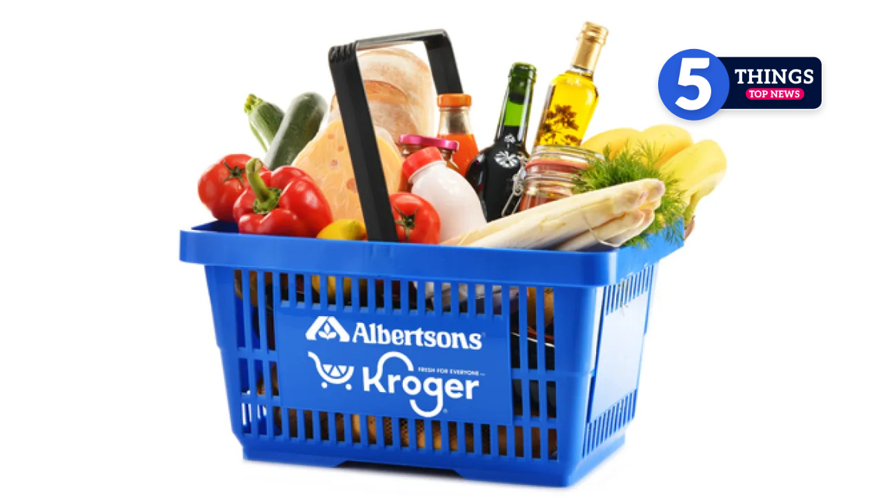 A shopping basket full of groceries with the Kroger and Albertsons logos on it.