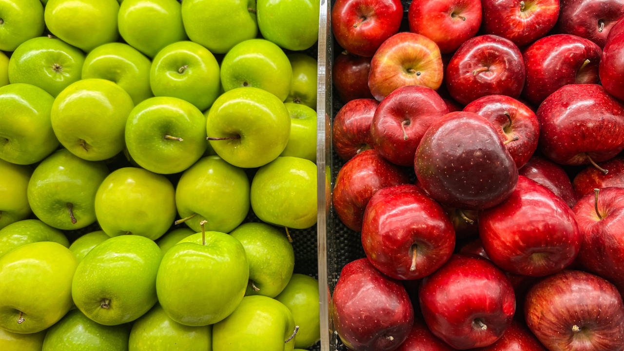 Green apples on the left and red apples on the right.