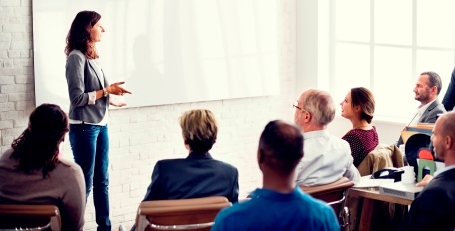 A group of people receiving training