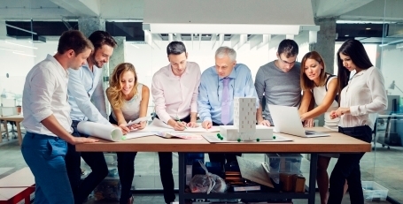 Group of office workers getting Business training