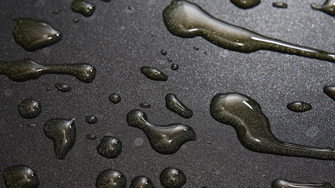 Water droplets on a dark surface