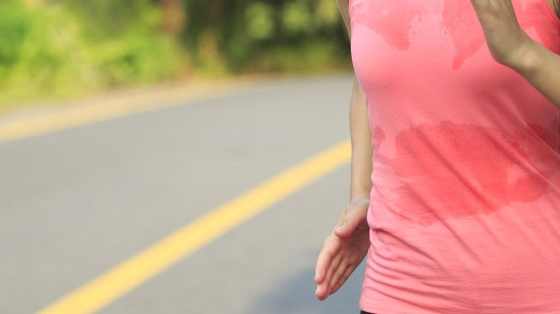 Sweaty pink shirt on a runner