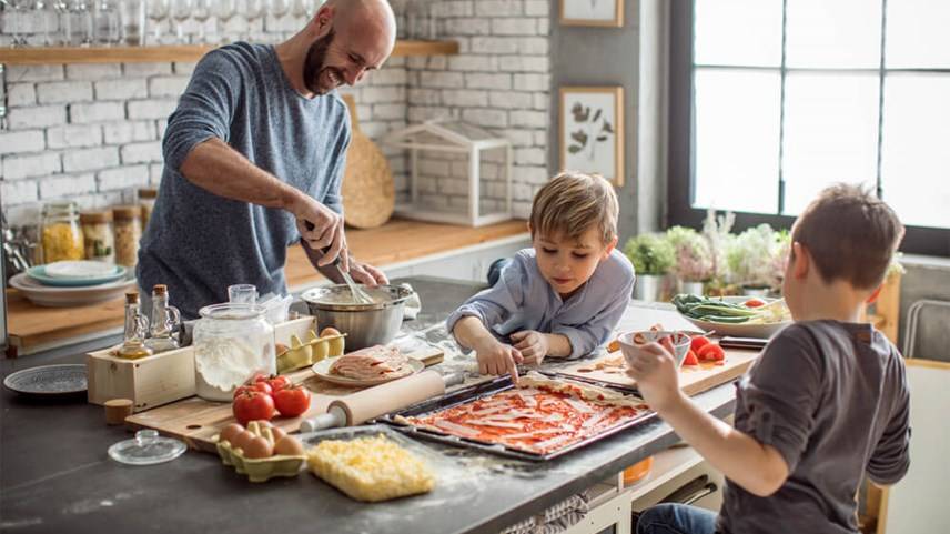 Dad and kids cooking