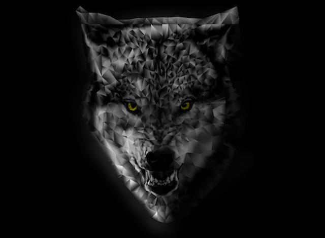 The head of a wolf against a dark background.