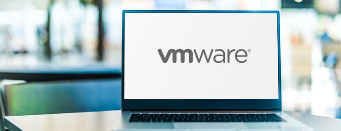 Laptop computer displaying logo of VMware
