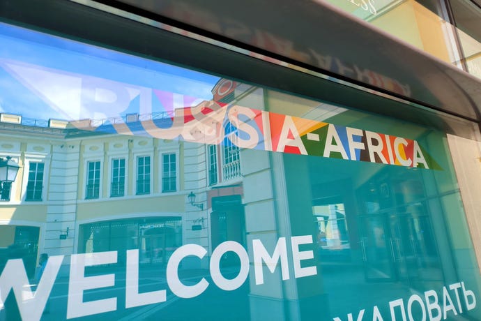 Window with the text of the Russia Africa summit