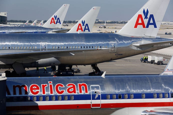 a lineup of American Airlines planes