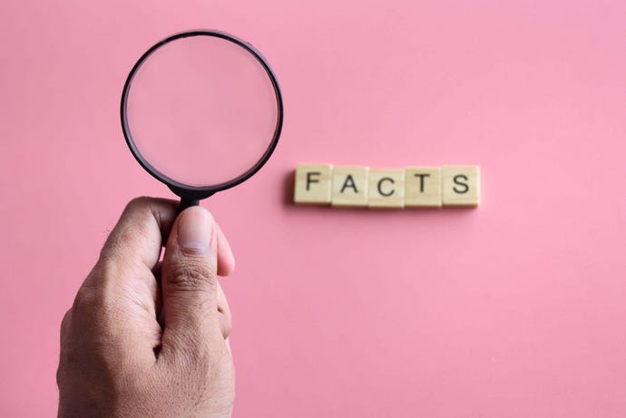 Magnifying glass and the word "FACTS"