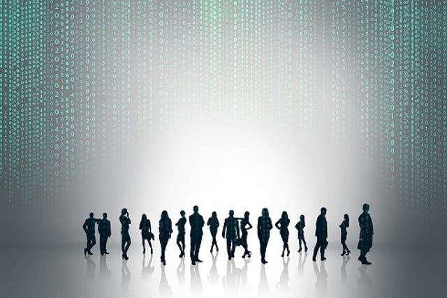 Silhouettes of business people appeared through the matrix code.