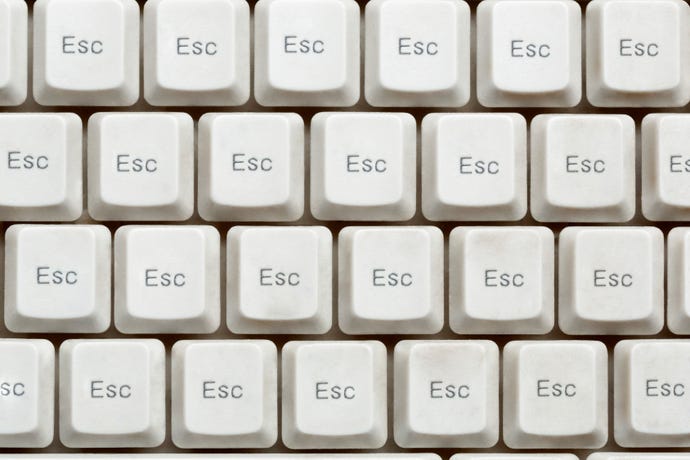 Image of a sea of Escape keys on a keyboard